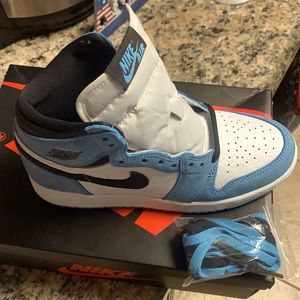 (1) pair of Air Jordan 1 sneakers